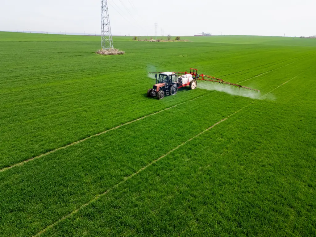 Tractor and Sprayer in Field